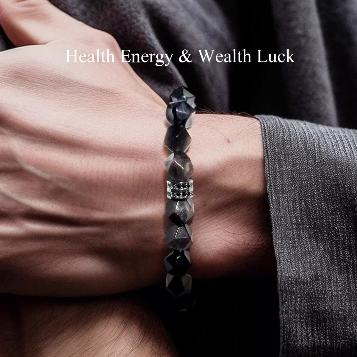 A man wearing this obsidian bracelet on his wrist